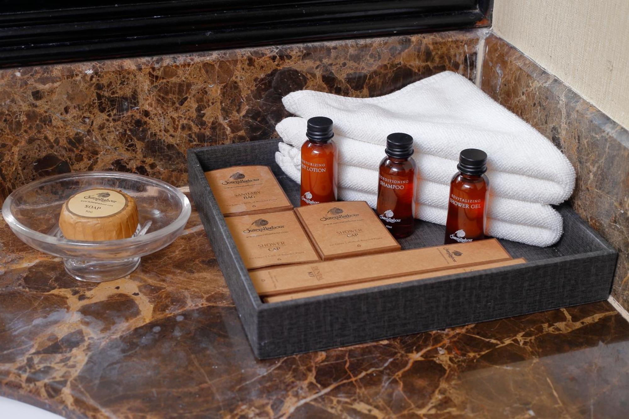 The Pacific Sutera Hotel Kota Kinabalu Kültér fotó A selection of toiletries in a hotel bathroom